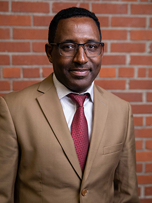 Aweke Tadesse, Ph.D., MA, HCD, MSW